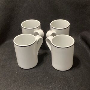 4 Dansk White Mugs with Blue Trim.